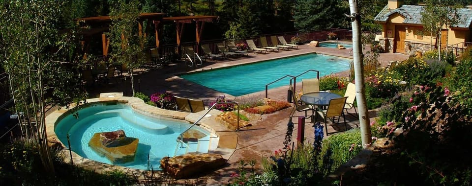 Heated Pool and Hot Tub with views of Vail Mountain and Gore Creek River
