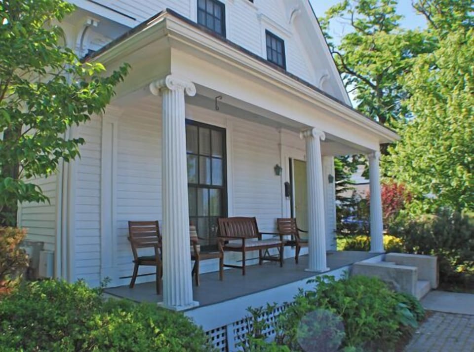 The front porch and house from the street