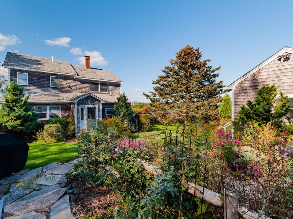 Beautiful gardens surrounding the main house and guest cottage