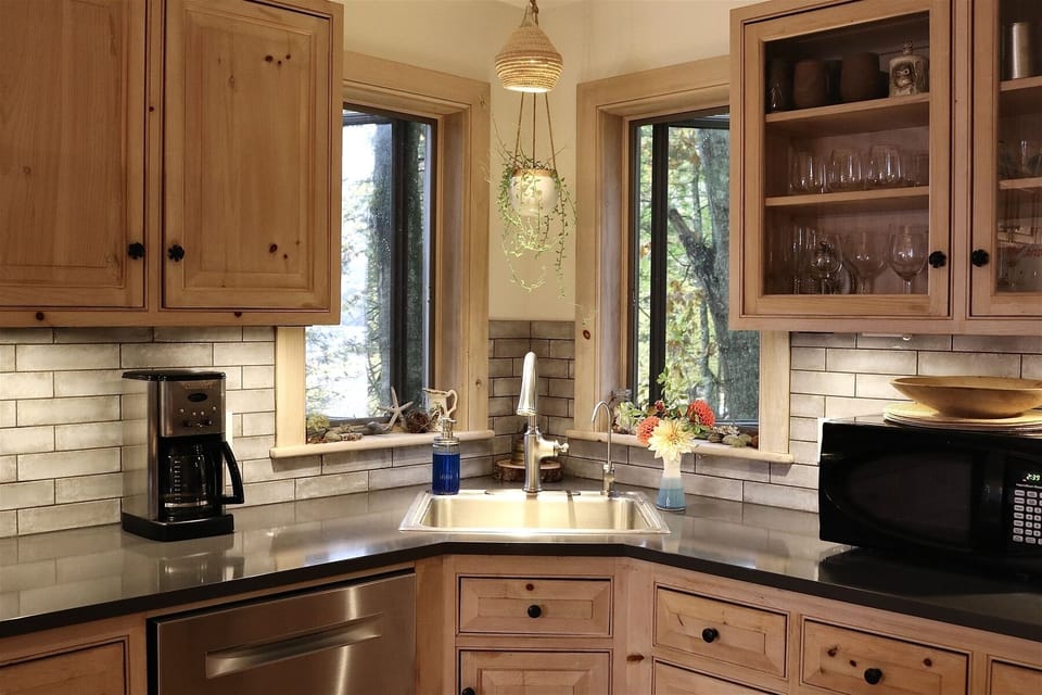 Well equipped kitchen with stainless steel appliances newly updated for the 2026 season