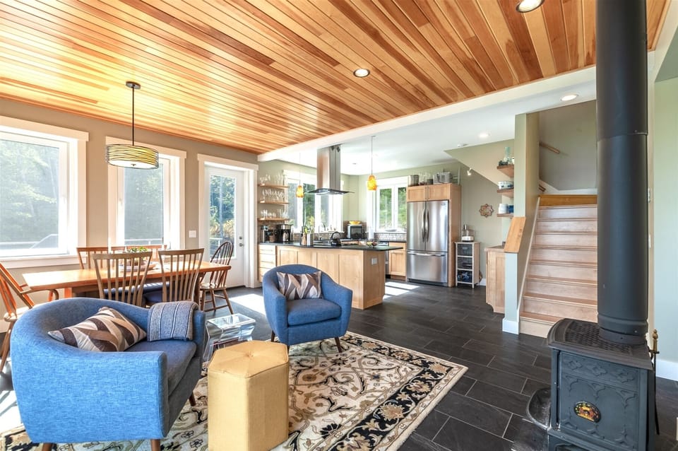 Living room and dining area- stairwell to Master Bedroom