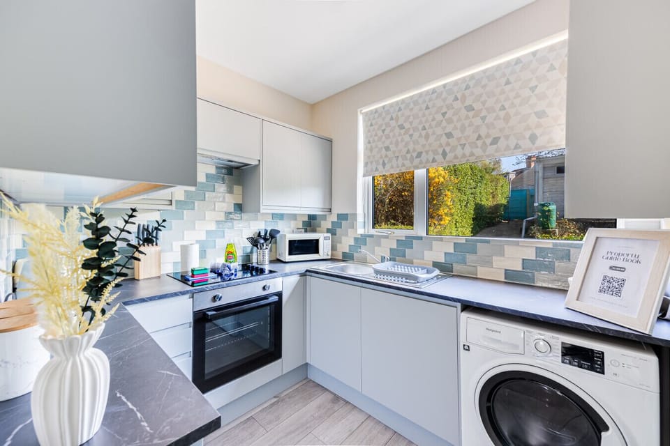 A fully equipped kitchen with everything you need to prepare a home cooked meal