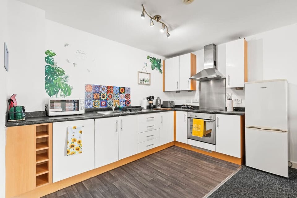 A fully equipped kitchen with every you need to prepare a home cooked meal