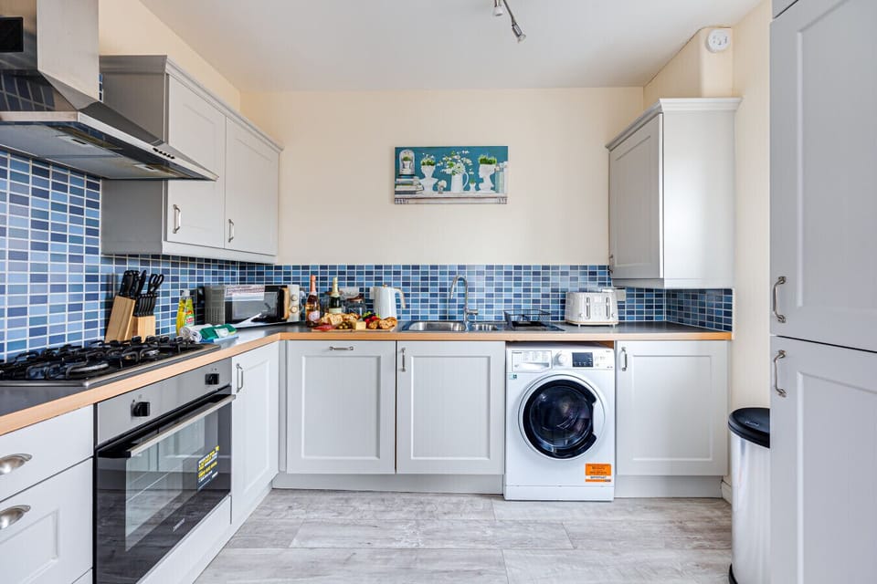 The kitchen is fully equipped with all the essentials you need to prepare and enjoy a home-cooked meal during your stay.