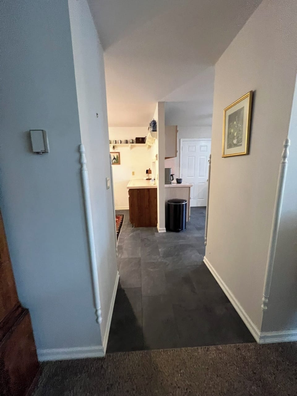 Leads to the dining/kitchen area
