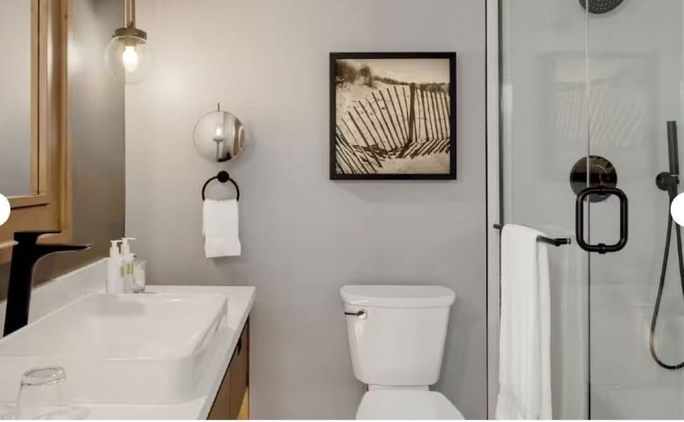 Step into a bright bath designed for effortless comfort.