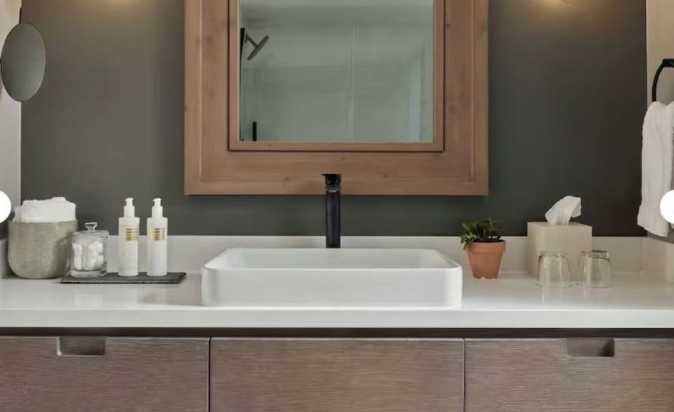 Indulge in a sleek vanity setup for easy morning routines.