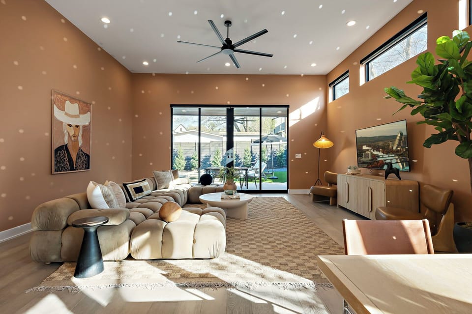 Transform your living space with a couch that's as unique as you are! Let the natural light pour in through those big windows while you relax in style.