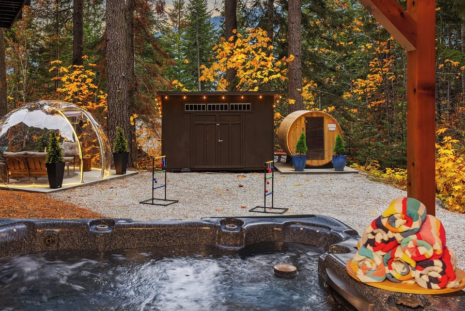 Backyard: Geo dome, covered hot tub and barrel sauna