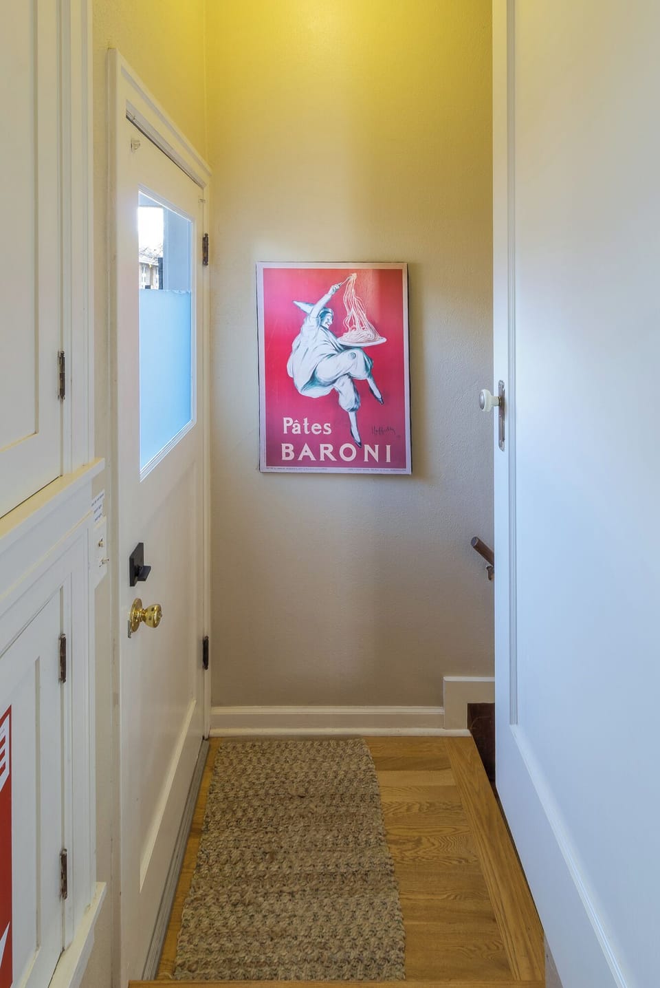 Stairs down to the backyard and the open basement