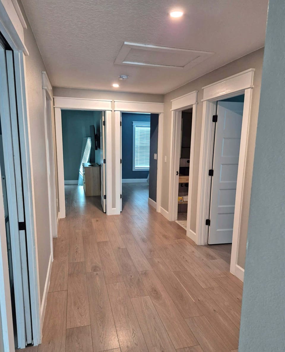 Hall to 4 bedrooms and 3 bathrooms
