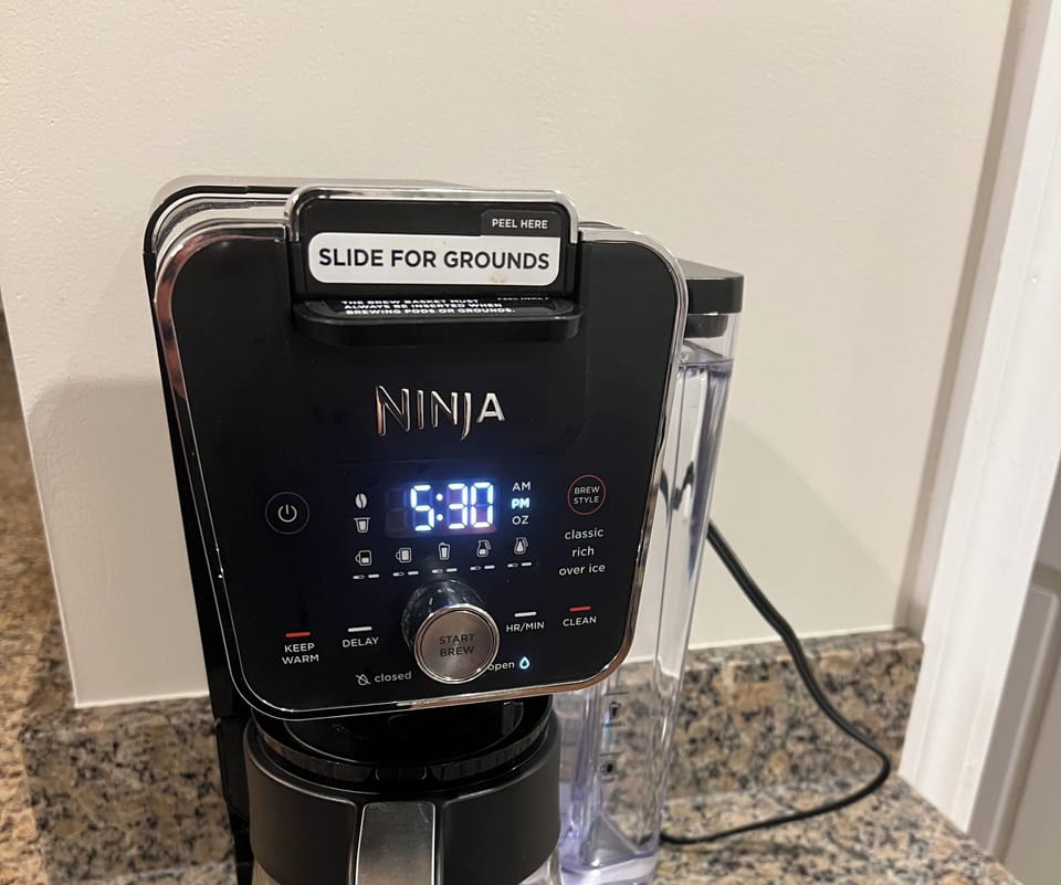 Ninja DualBrew 12-Cup Coffee Maker brews both ground coffee and K-Cup pods.