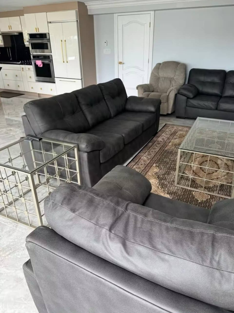 Living room with 3 regular sofas