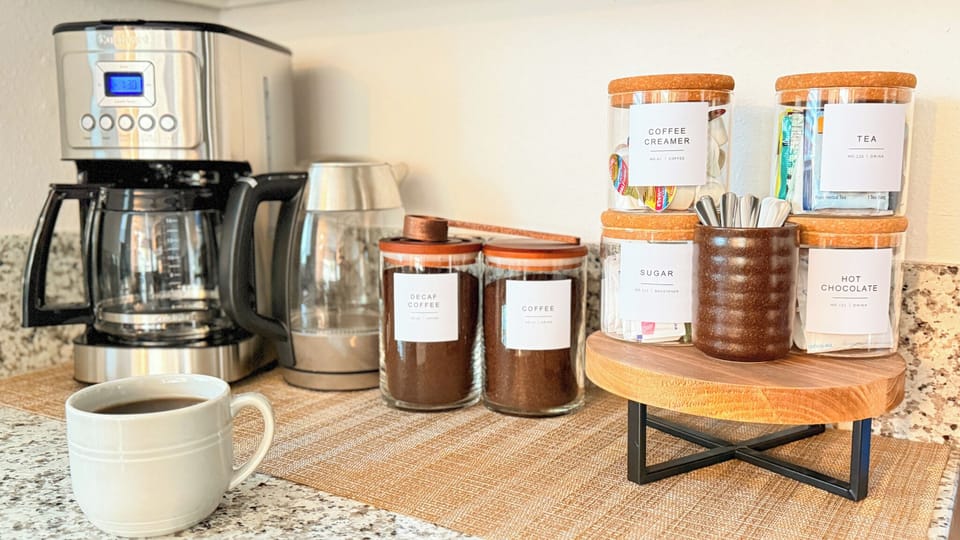 Fully stocked coffee bar with plenty of options. 