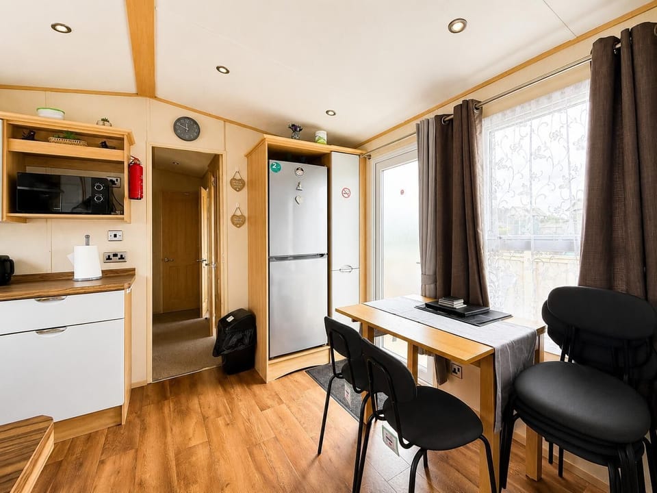 Great dining area. It's great to enjoy a caravan holiday with all the family, and at this caravan there's space for everyone to spread out and feel at home.
