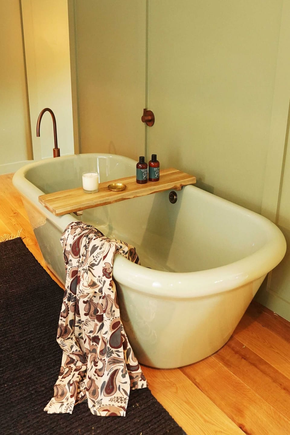 Unwind with a deep soak and spa-style bath essentials.