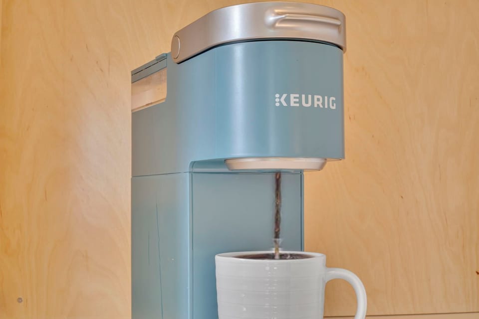Start your morning with a fresh brew from our cheerful Keurig, because every day deserves a bright beginning.