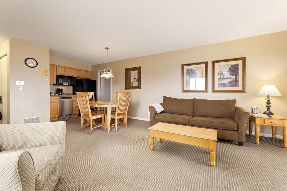 Open-concept living & dining space ideal for relaxing or gathering together.