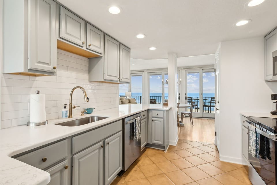 Luxury Kitchen with Quartz Countertops and Stainless Steel Appliances