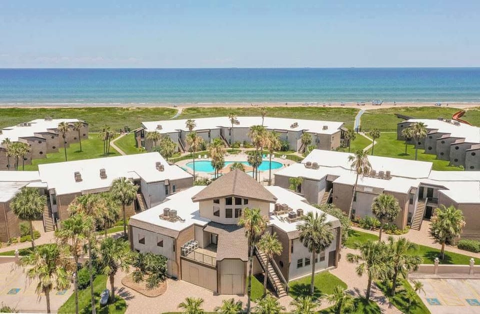 Aerial view of Sunchase, steps away from the beach.