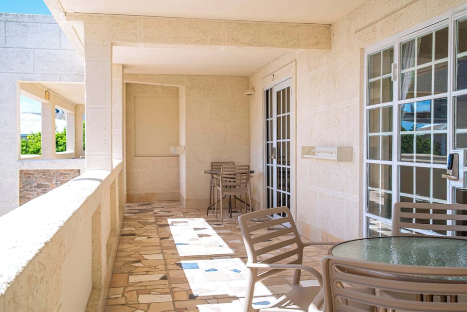 Shared patio awaits! Enjoy morning coffee here.