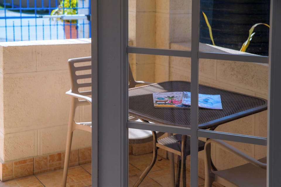 Enjoy this relaxing shared patio space.