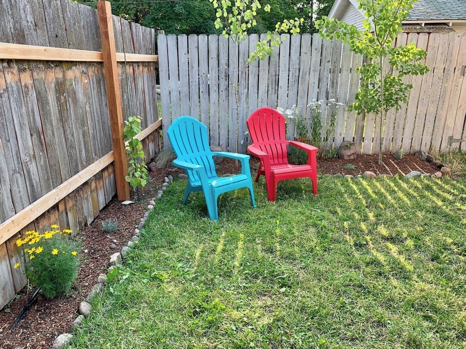 A petite, postage stamp yard with privacy fencing lets you enjoy the fresh air with your morning coffee or evening tea. 