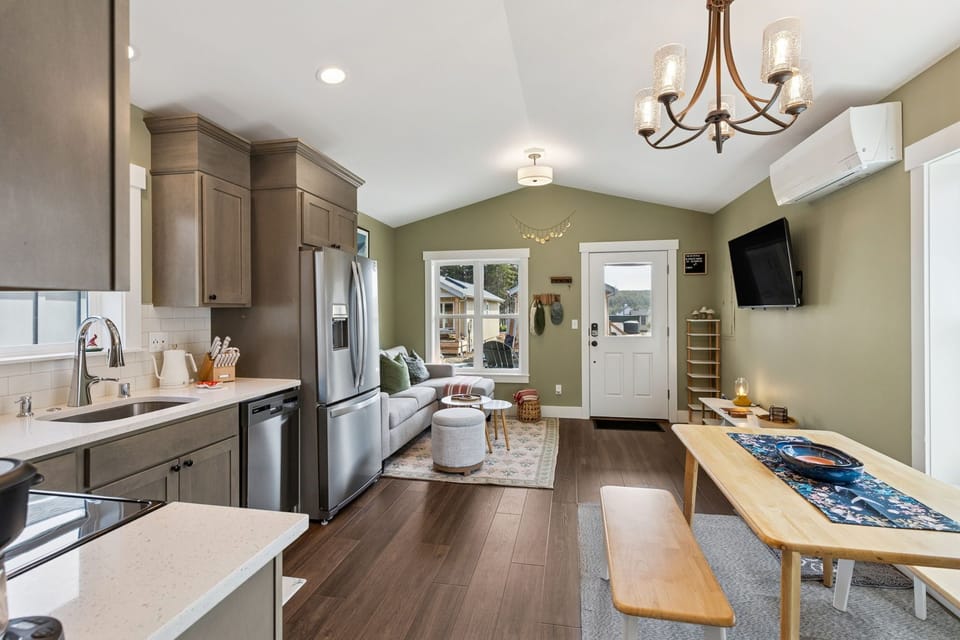 Open concept kitchen, living, and dining rooms