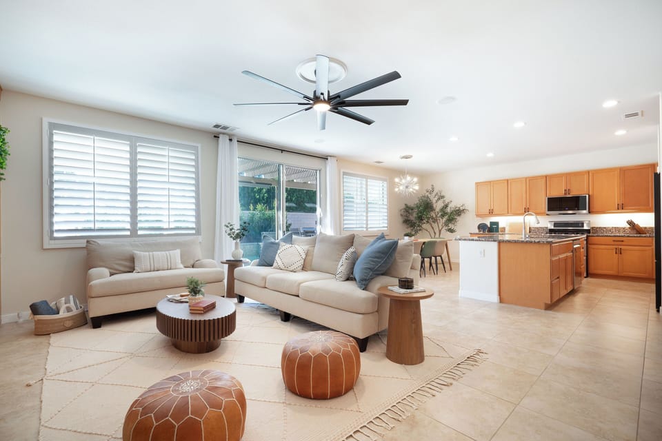 This photo pictures the open layout of the living/ dining areas.
