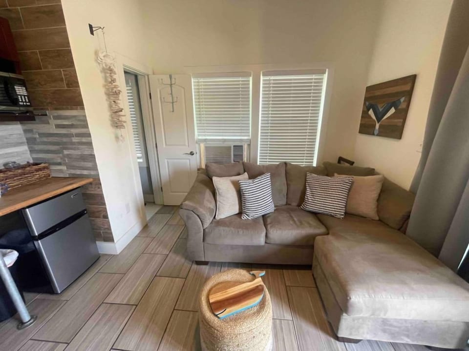 Full size sofa cold AC window unit street view only.