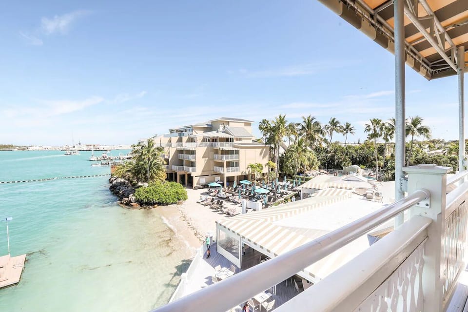 Breathe in ocean breezes from your balcony above the beach.