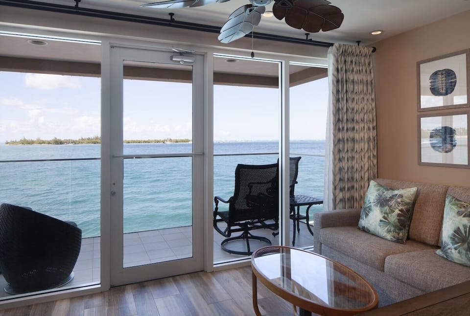 Soak up the panoramic view through wide glass doors.
