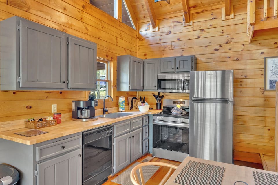 Fuel your adventures with meals made in this cozy fully equipped cabin kitchen.
