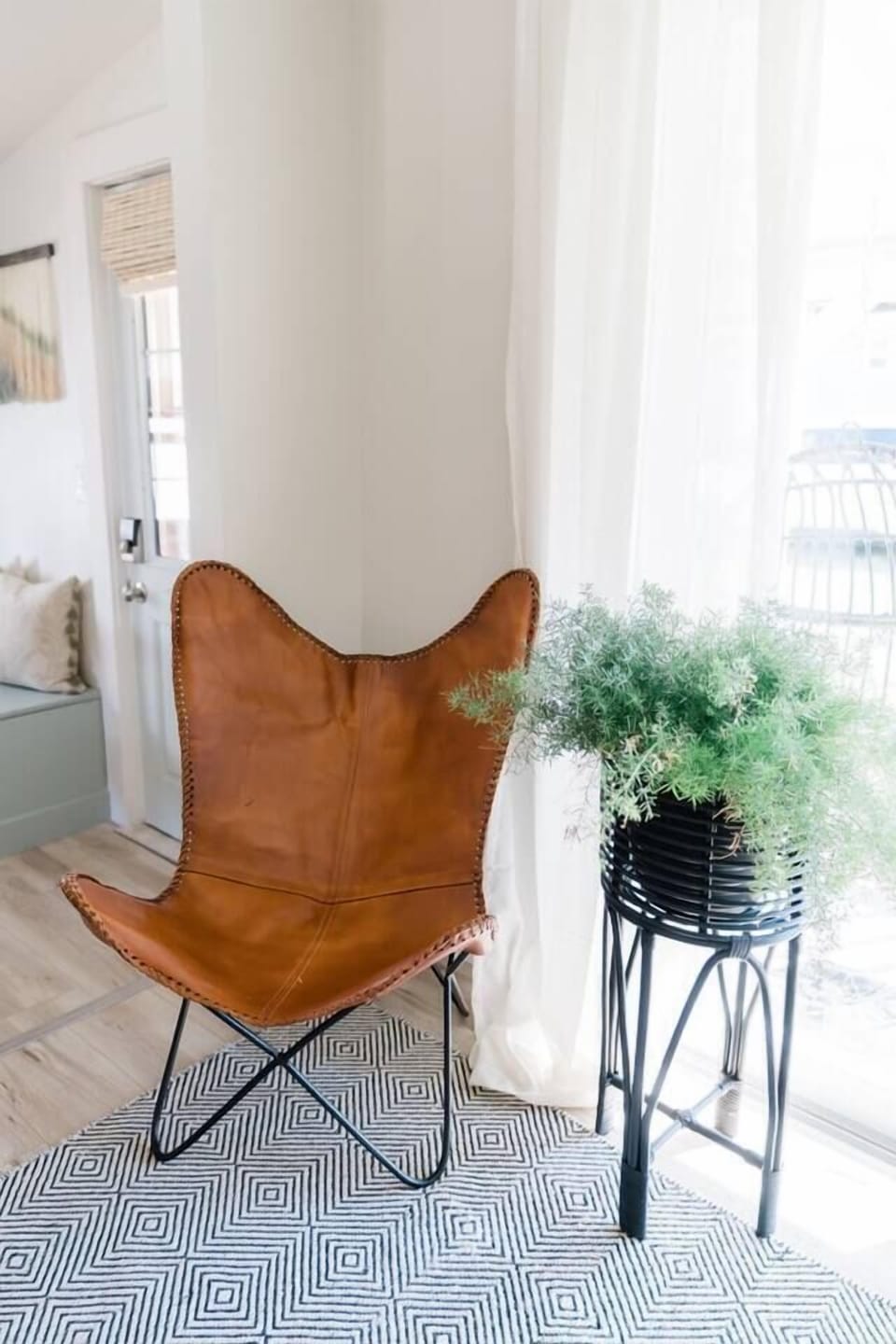 leather butterfly chair makes a perfect little reading nook 