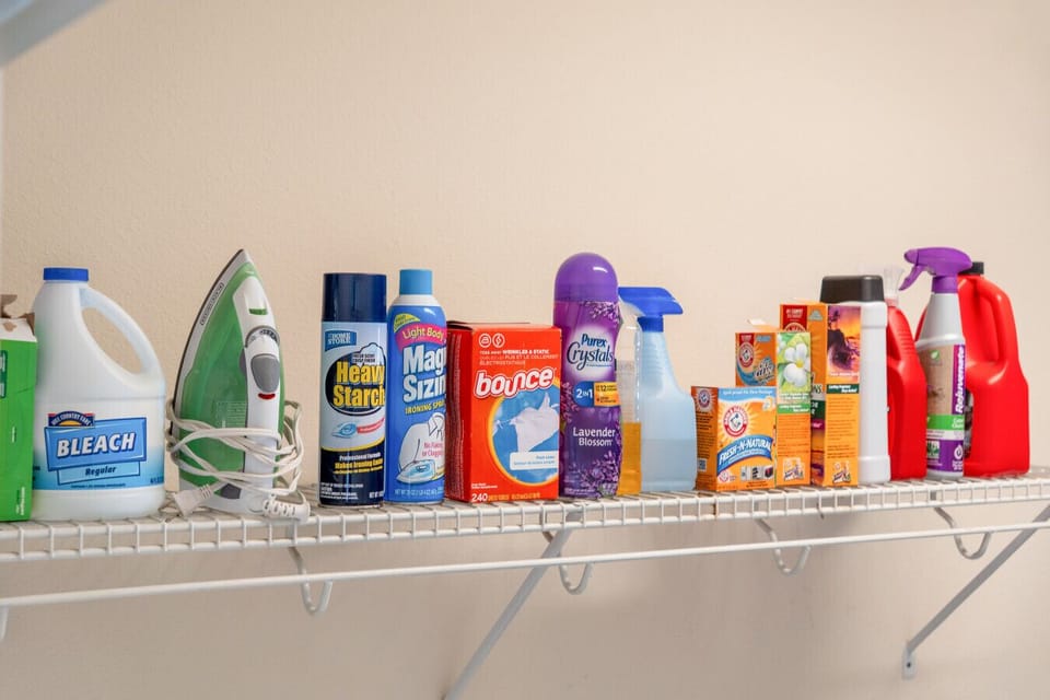 Ready for laundry day: a shelf full of cleaning essentials.