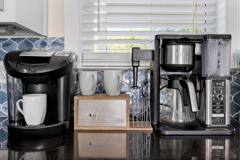Coffee drinkers can enjoy either a regular drip coffee maker, or a Keurig machine.
