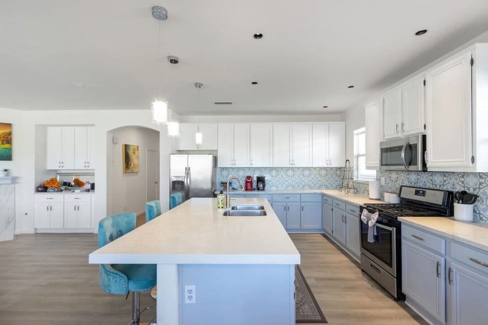 Island tabletop, barstool and stylish backsplash