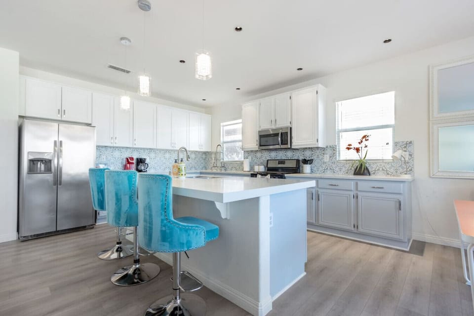 Our open floor plan is just perfect for chat while meal is being prepared