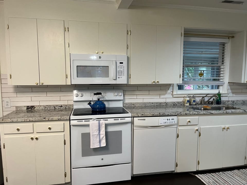 Kitchen with GE Appliances, granite countertops, and lots of cabinet space
