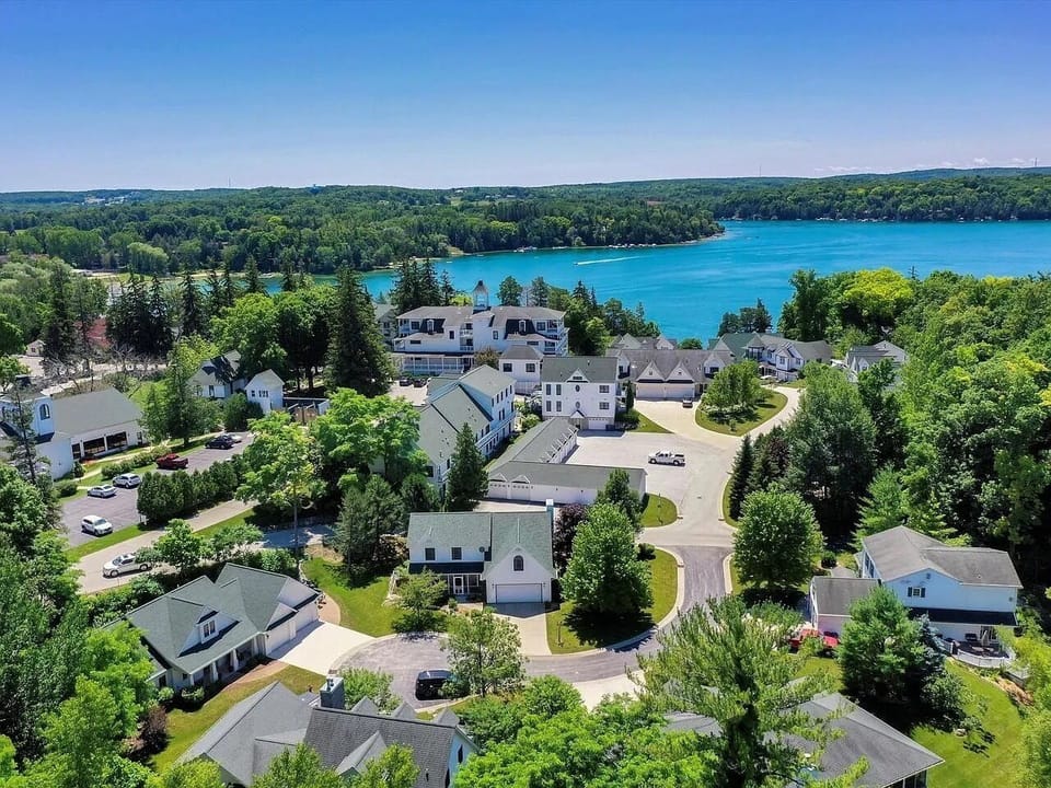 Aerial view showcasing the peaceful lakeside community below.