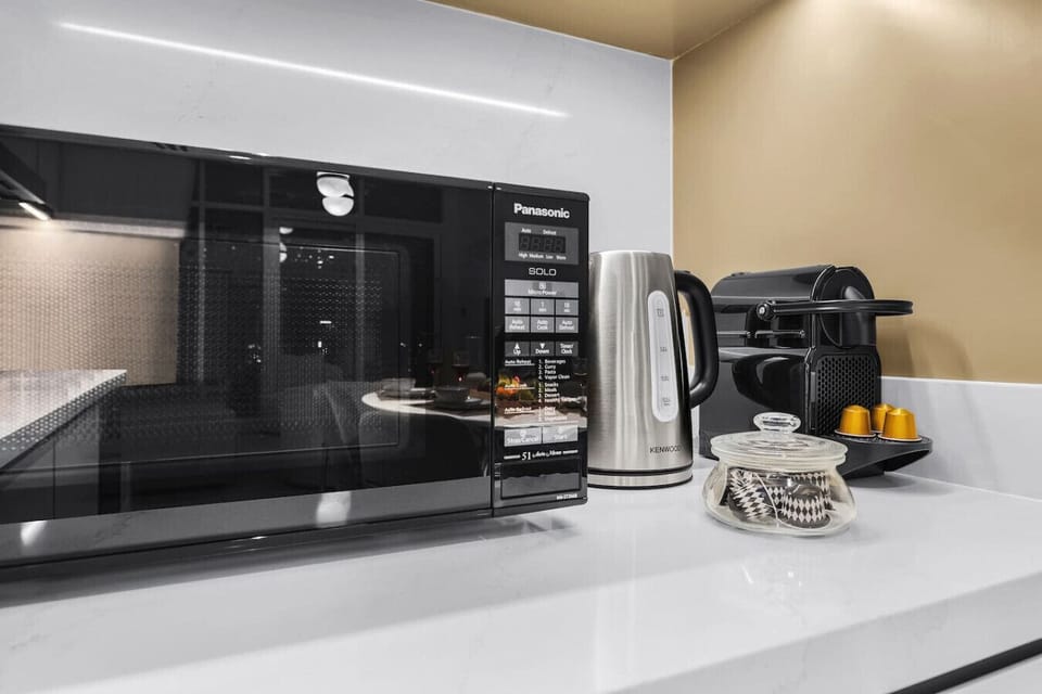 Kitchen: Modern appliances await! Brew coffee and enjoy delightful meals in style.