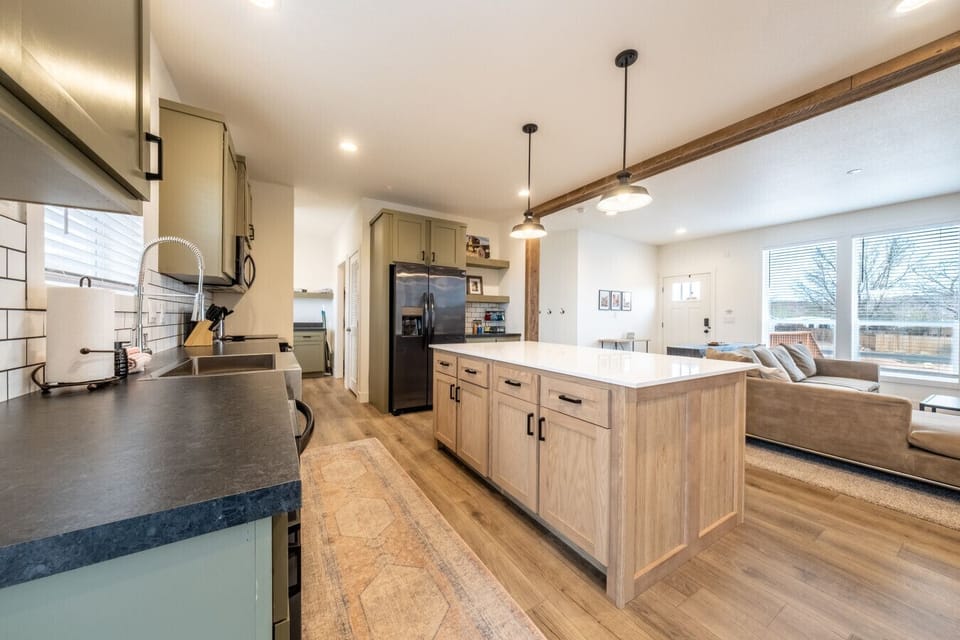 Open kitchen and living room to gathering with friends and family