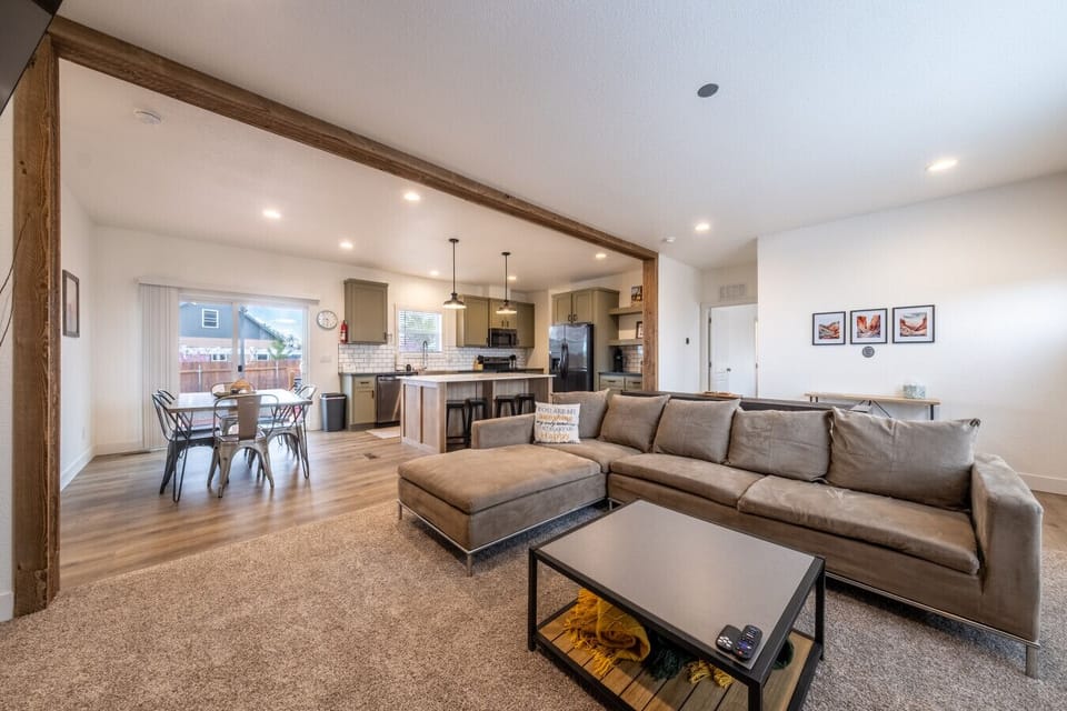 Open concept living room, kitchen and dining space