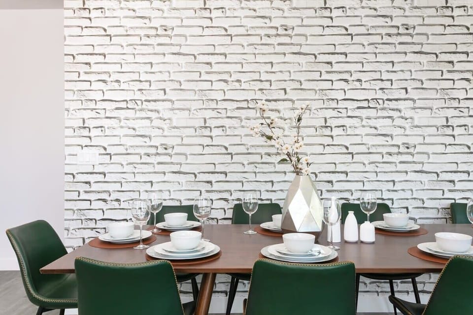 Dining space with brick accent wall