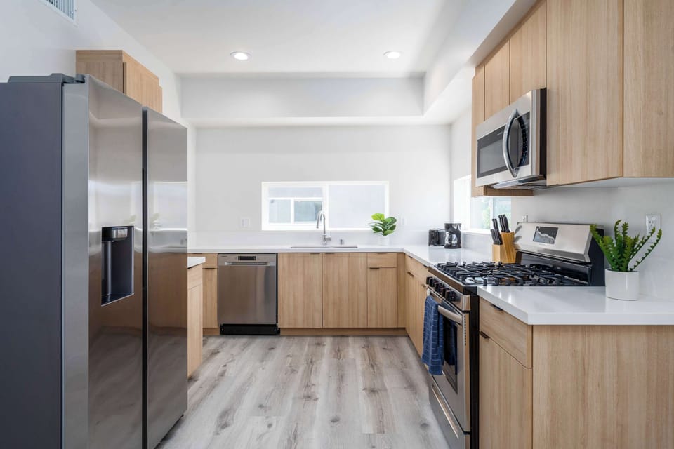 "Your cooking space, complete with modern appliances."
