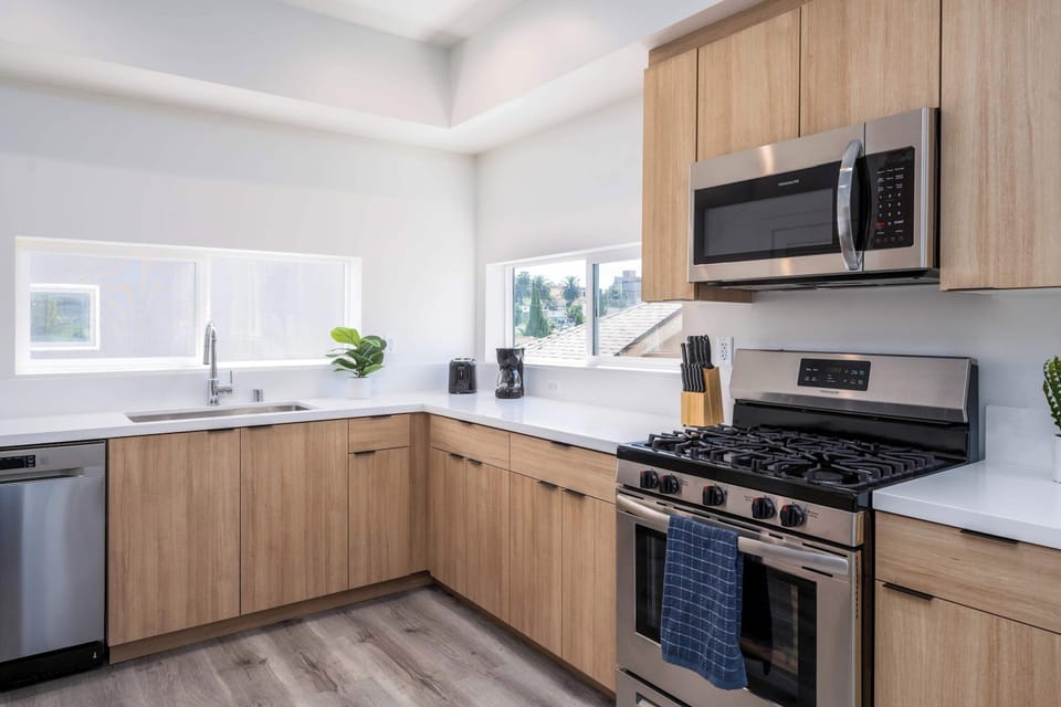 "Your cooking space, complete with modern appliances."