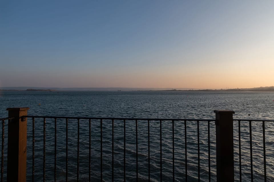 Shoreline Coastal View From Balcony At Sunrise