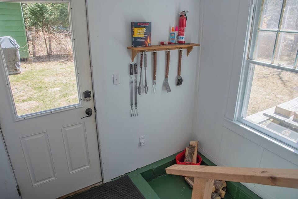Back mudroom with grilling supplies