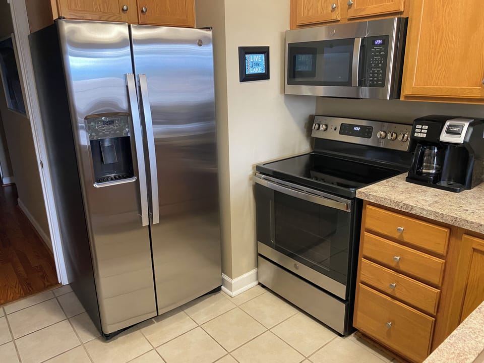 Kitchen with new stainless steel appliances
