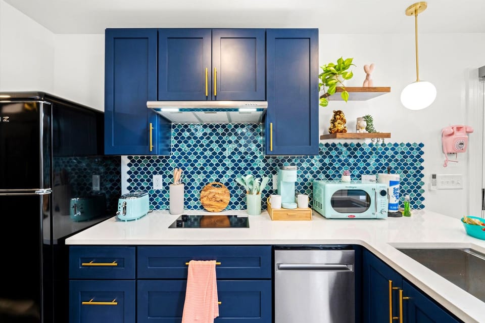 Classy, mid-mod kitchen-perfect for preparing a coffee for a connecting convo